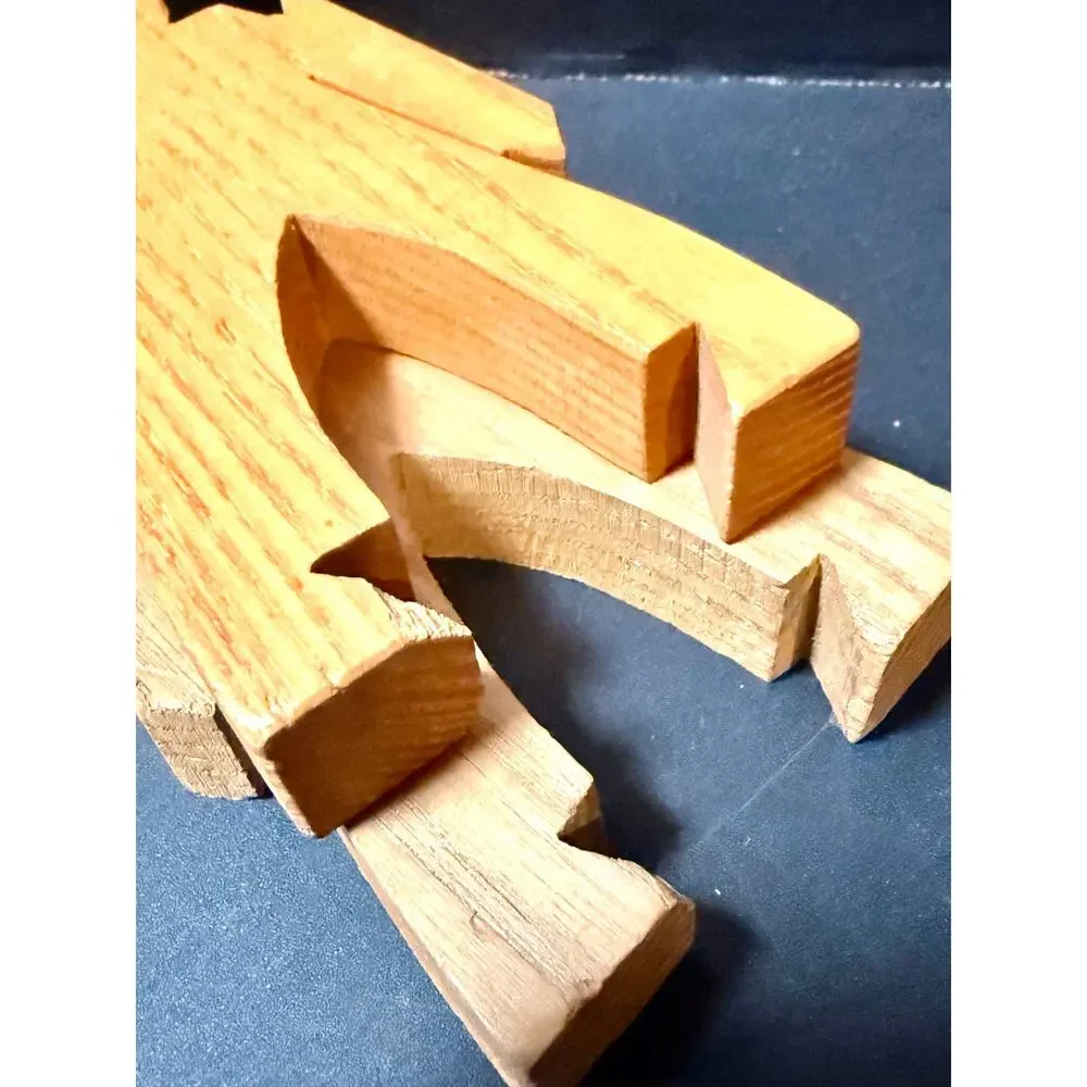 Wooden Stacking Dudes interlocking human shaped made of multiple woods
